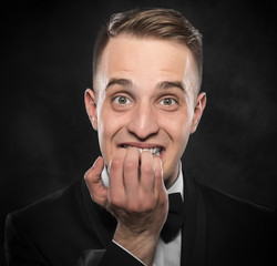 Excited or scared young man.