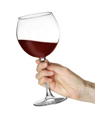 Woman holding glass of wine isolated on white