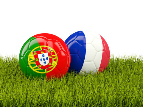 France and Portugal soccer  balls on grass