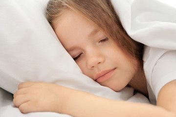 Adorable sleeping little girl, close up