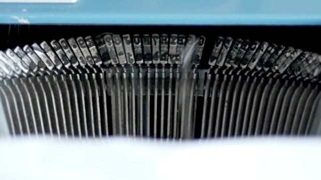 Typing. Metal types in the typewriter