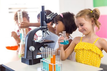 Girl holding chemical