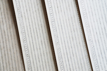 Obraz premium Diagonal vintage punched card textured background