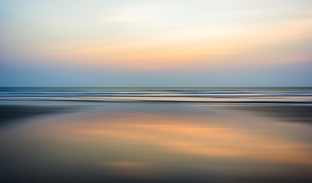 Wide ocean horizon sunset blur motion abstraction
