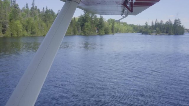 nature canada ontario wilderness forest lake float plane flying over
