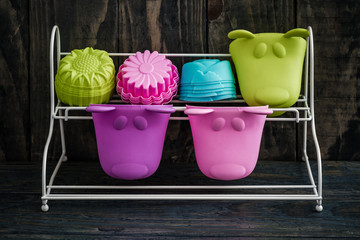 Stack of Colorful Silicon Cake Molds