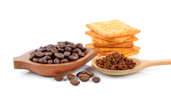 coffee beans and cracker on white