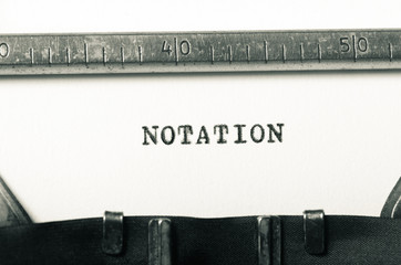 word notation typed on typewriter