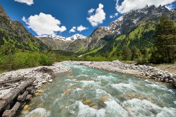 Dolra river of Becho Valley with panoramic view of Ushba mountain