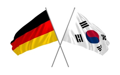 Germany and South Korea flags crossed and waving in the wind