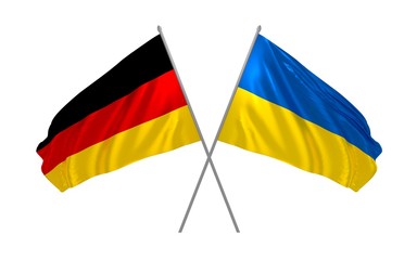 Germany and Ukraine flags crossed waving in the wind