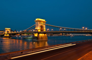 View of the famous chain bridge in Budapest at night.