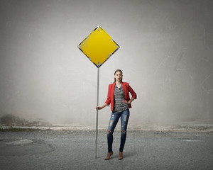 Pretty girl with roadsign . Mixed media