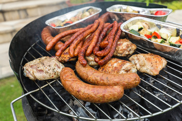 barbecue with delicious grilled meat on grill