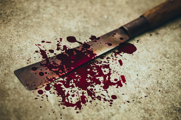 knife with grungy blood mark, crime murder and violation concept.