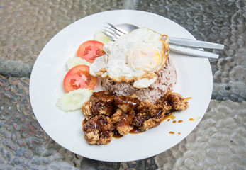 Teriyaki chicken on rice with fried egg