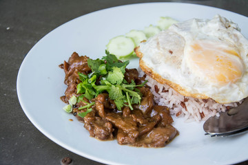 Braised pork on rice with fried egg