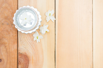 water in silver bowl with jasmine white flower, Thailand Songkarn