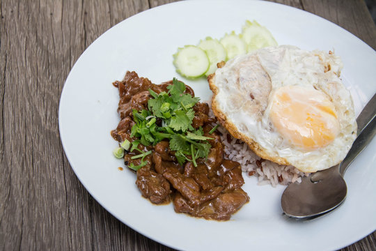Braised pork on rice with fried egg