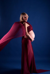 Fototapeta premium Pregnant woman is expecting a baby