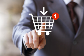 Businessman push web button shopping cart online buy - 115294026