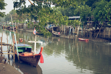 Fototapeta na wymiar Fishing village in Southeast Asia;;vintage style