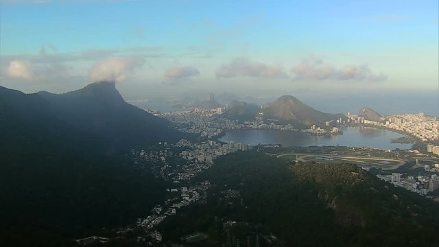 Aerial view of Rio De Janeiro with Corcovado Hill in clouds, Brazil
