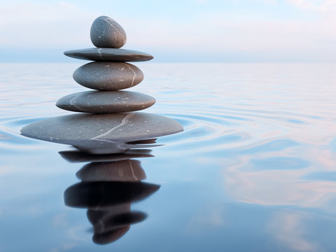 Balanced Zen stones in water 