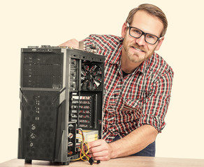 Male technician with computer.