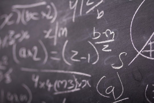 Close up of blackboard with maths equations