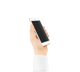 Gold smart phone blank screen mock up holding in hand. Mockup of golden smartphone empty display isolated. Cellphone clear monitor hold arm white sleeve shirt. Phone side holding, clipping path