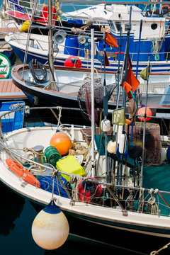 Fototapeta Fishing boats stranded at the port