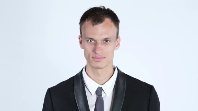 Smiling businessman inviting - business, office and technology concept