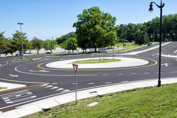 Roundabout For Traffic In The Suburbs - obrazy, fototapety, plakaty