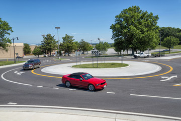 Traffic Roundabout  With Vehicles Driving Around It