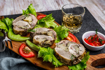 Roulade of duck stuffed with apple and ginger