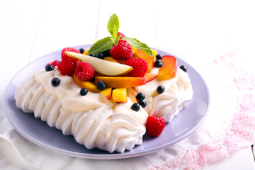 Mixed fruit and berry Pavlova,