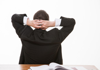 Young businessman turning back and dreaming