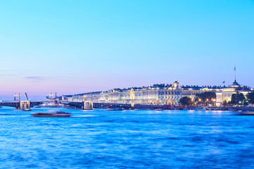 Russia, Saint-Petersburg, 02 July 2016: Opening Palace Bridge, a lot of Observing tourists, Neva River at sunrise, Winter Palace, the Hermitage, the Admiralty, a lot ships and boats, long exposure 