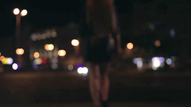 Close Up Women's Legs Walking Away At Night