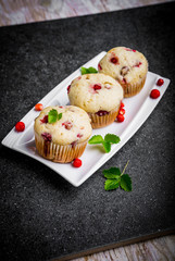 Homemade strawberry muffins in paper cupcake holder