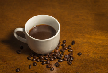 Obraz na płótnie Canvas Cup of Espresso and coffee beans
