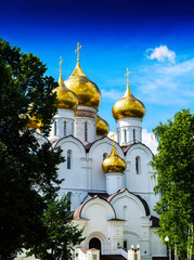 Fototapeta na wymiar Vertical vibrant vivid Russian orthodox church temple background