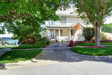 Large luxury  craftsman classic American house exterior.