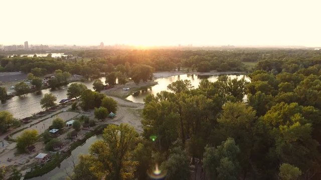 Aerial view of the evening city park.