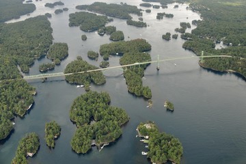 aerial view of the Thousand Islands Bridge  across the Saint Lawrence river , rod leading to the US...