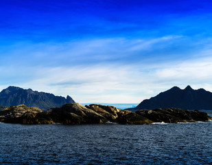 Fototapeta na wymiar Horizontal vivid Norway fjord mountains inn ocean horizon landsc