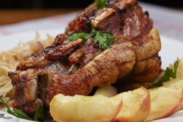 fried pork knuckle with potatoes and cabbage