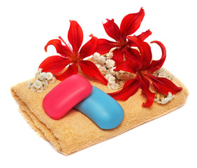 Soap, flower and towel