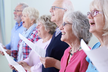 Group Of Seniors Singing In Choir Together - obrazy, fototapety, plakaty